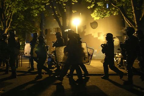Macron scraps trip amid rioting across France, as loved ones bury teen slain by police